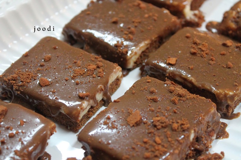http://www.qassimy.com/up/users/qassimy/picture-of-how-to-make-halawiyat-nescafe-biscuit-sweets-easy-arab-food-recipes.jpg